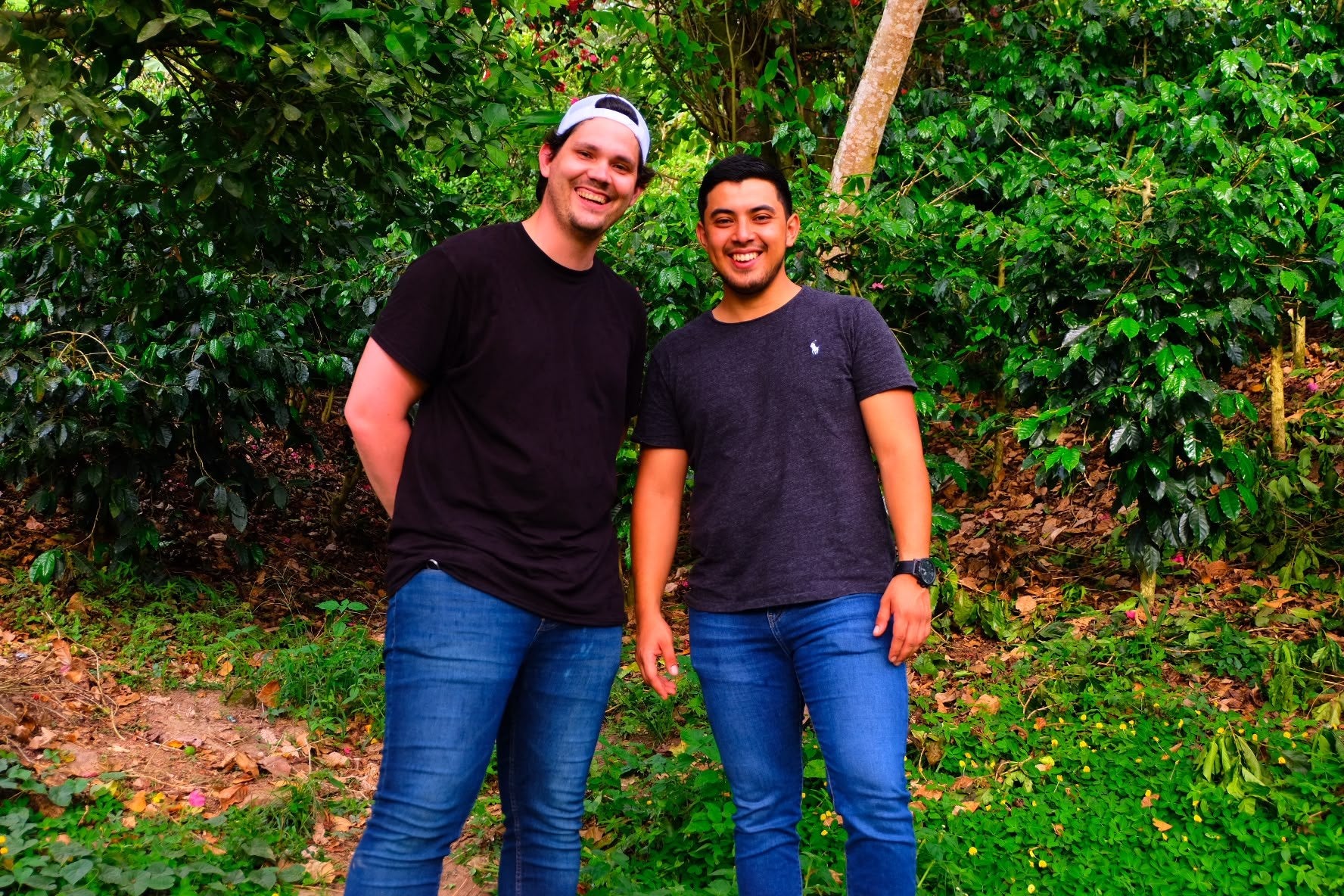Andrew Delgado and producer Fabio Caballero Jr. at a coffee farm in Honduras; producer relationship photo, not this specific Catuai lot.